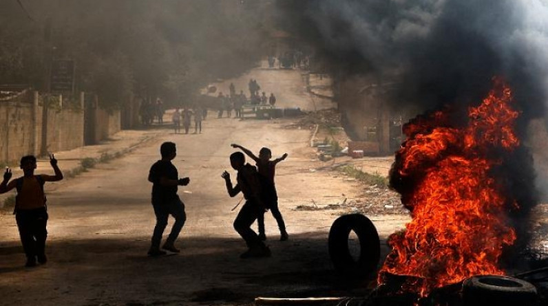 شهيد و16 إصابة في نابلس: اقتحامات واعتقالات بالضفة